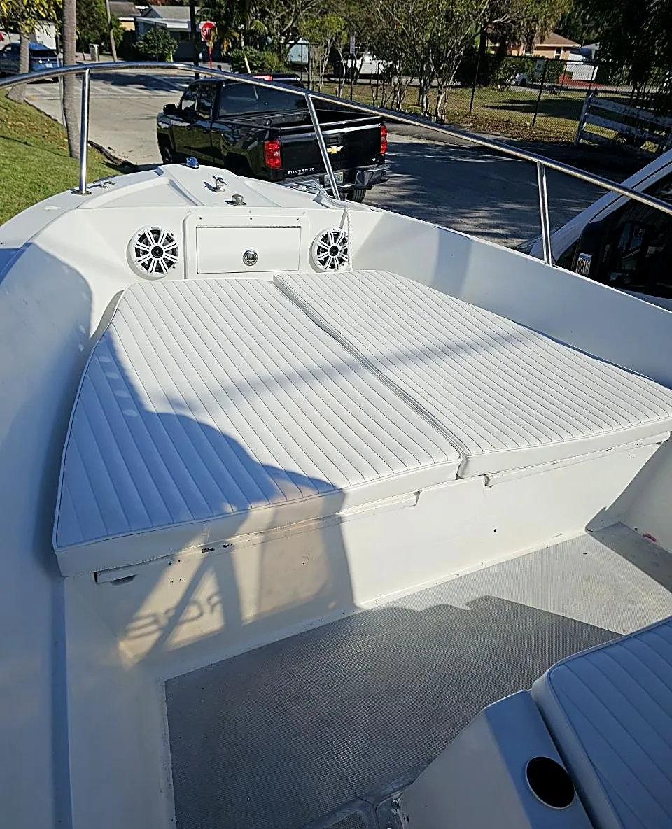New white bow cushions on a center console boat